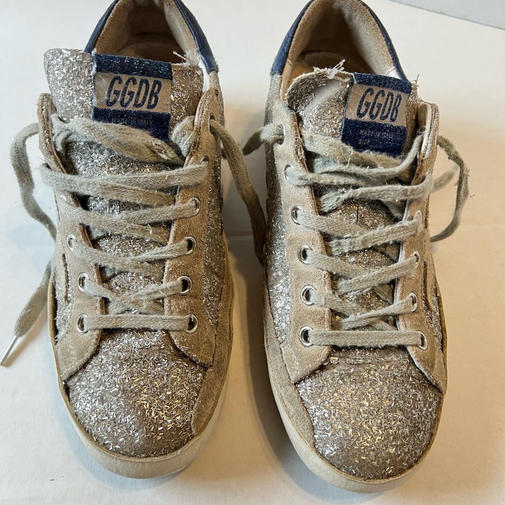 Golden Goose Silver Sneakers/Trainers adorned with a shimmering glitter uppers